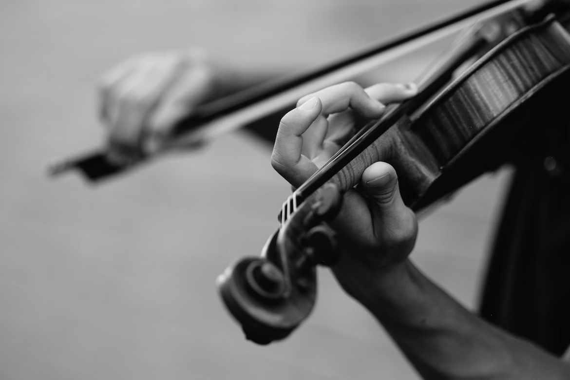 A person practicing on the violin